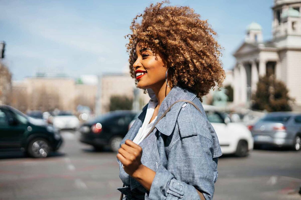 Beautiful,And,Confident,Black,Woman,Walking,Down,The,Street.,She